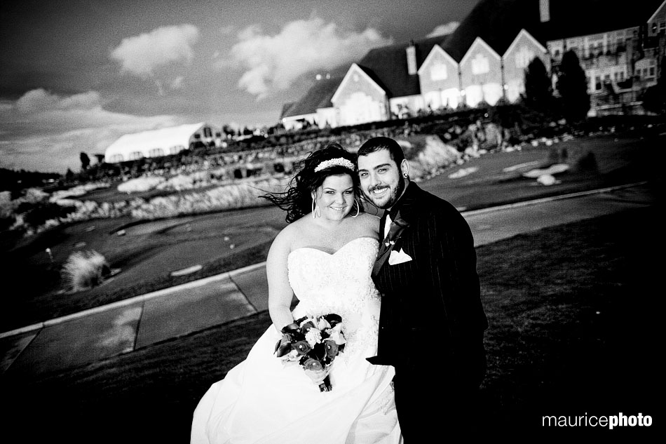 Bride and Groom posing in front of Newcastle Golf Club Bride and Groom posing in front of Newcastle