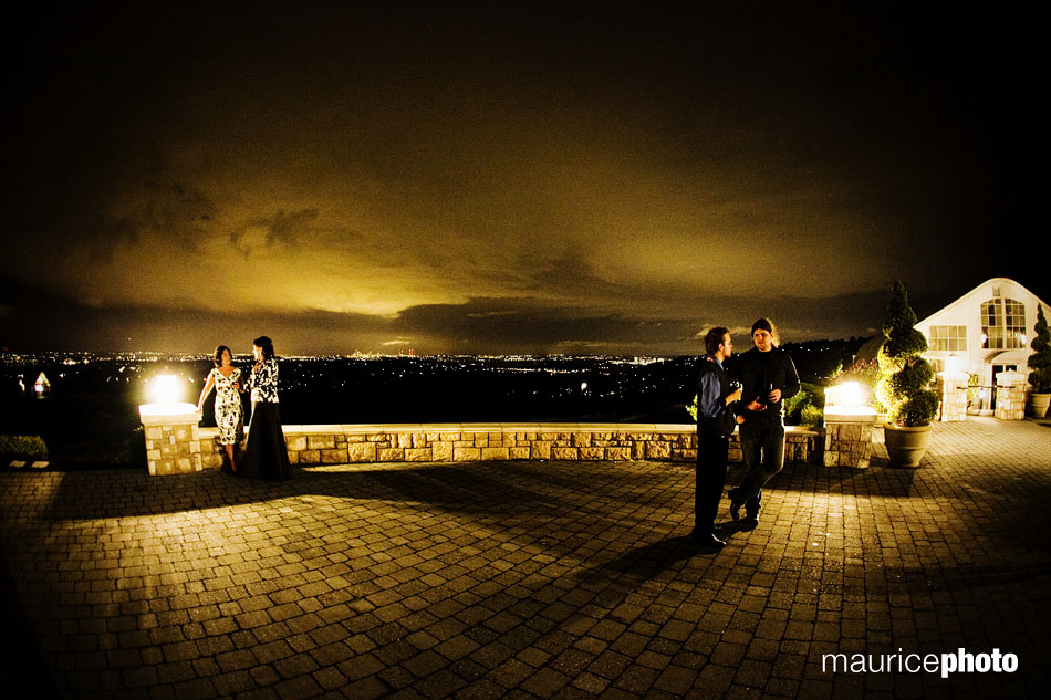 Night time view of the Newcastle porch overlooking Bellevue and Seattle Skylines.