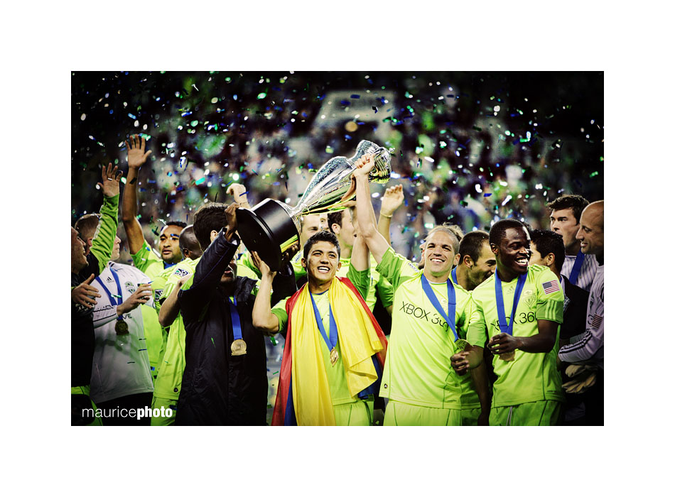 Members of the Seattle Sounders lift the US Open Cup. 