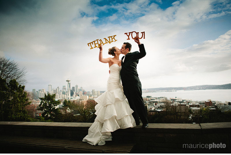 Bride and Groom with Thank You sign