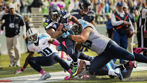 Marshawn Lynch of the Seattle Seahawks tackled on the 1 yard line
