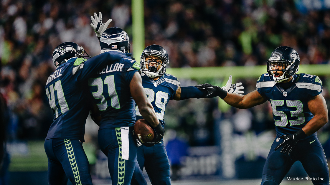 Kam Chancellor and Legion of Boom celebrate an interception