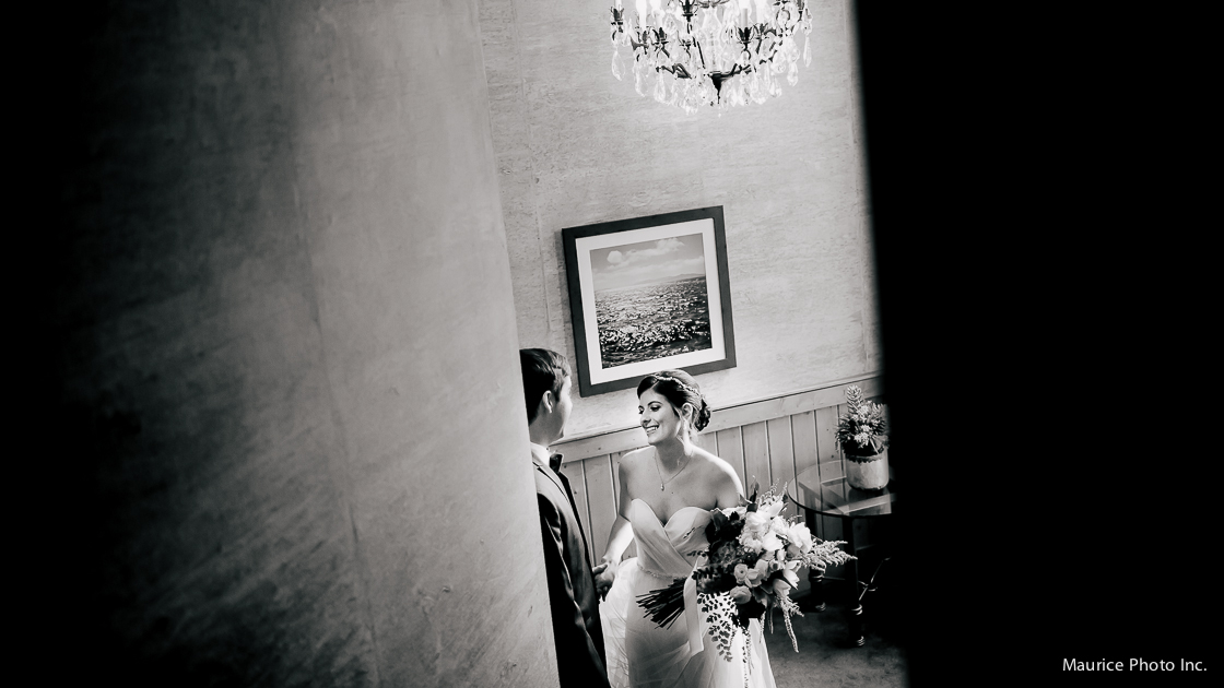 First Look photos at the Edgewater Hotel. Wedding Photography by Maurice Photo Inc. 