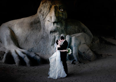 Wedding pictures at the Fremont Troll in Seattle
