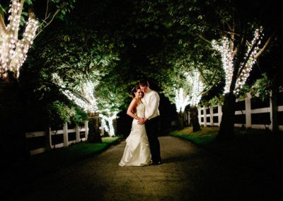 Bride and groom at night at Delille Cellars