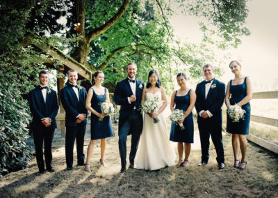 Bridal party poses for wedding pictures at Delille Cellars